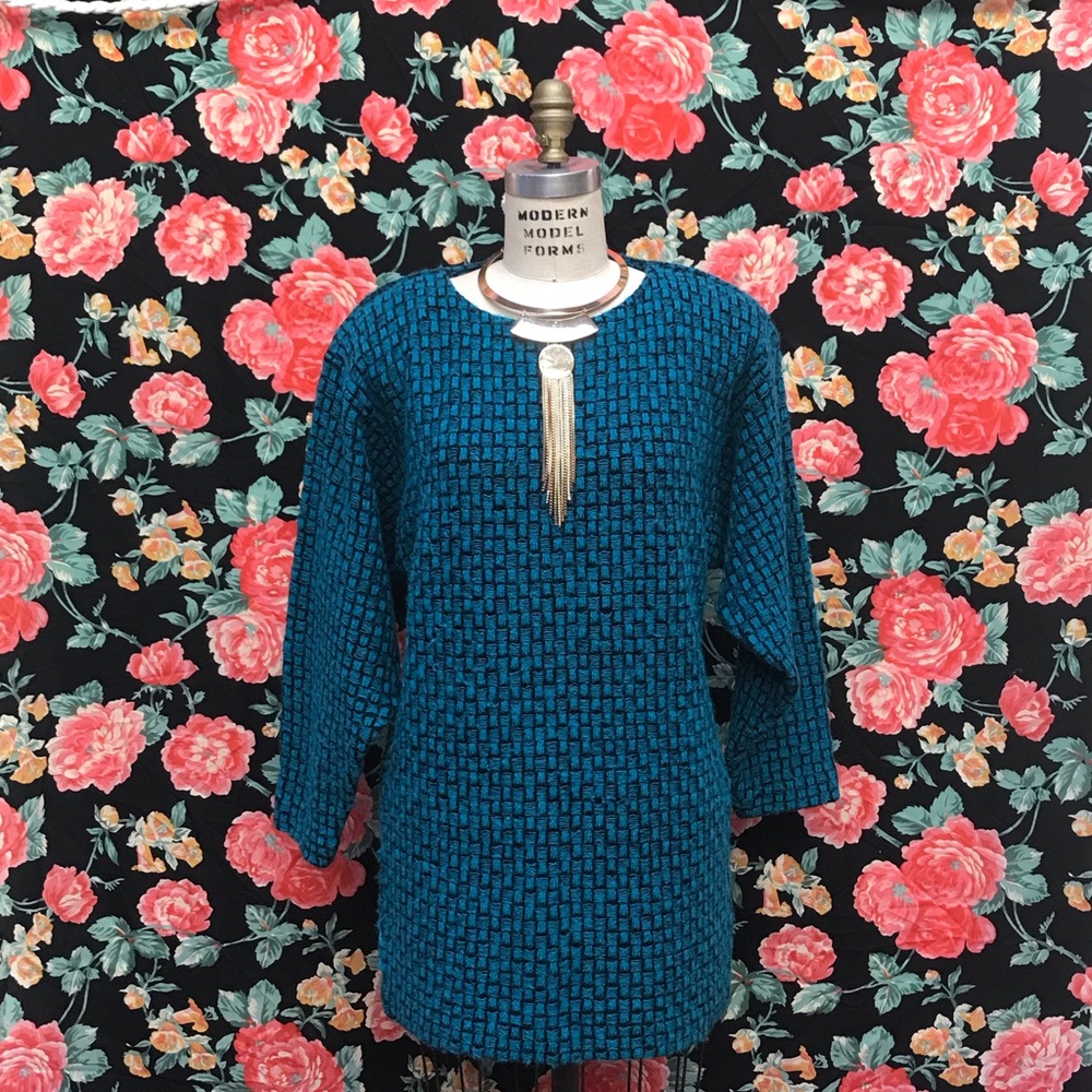 A unique, versatile, vintage, wool dress